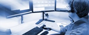 Man at Desktop Providing IT Support